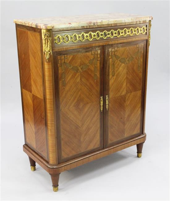 A French Louis XVI style ormolu mounted marquetry kingwood marble topped side cabinet, by Alexandre Hugnet, W.2ft 10.5in.